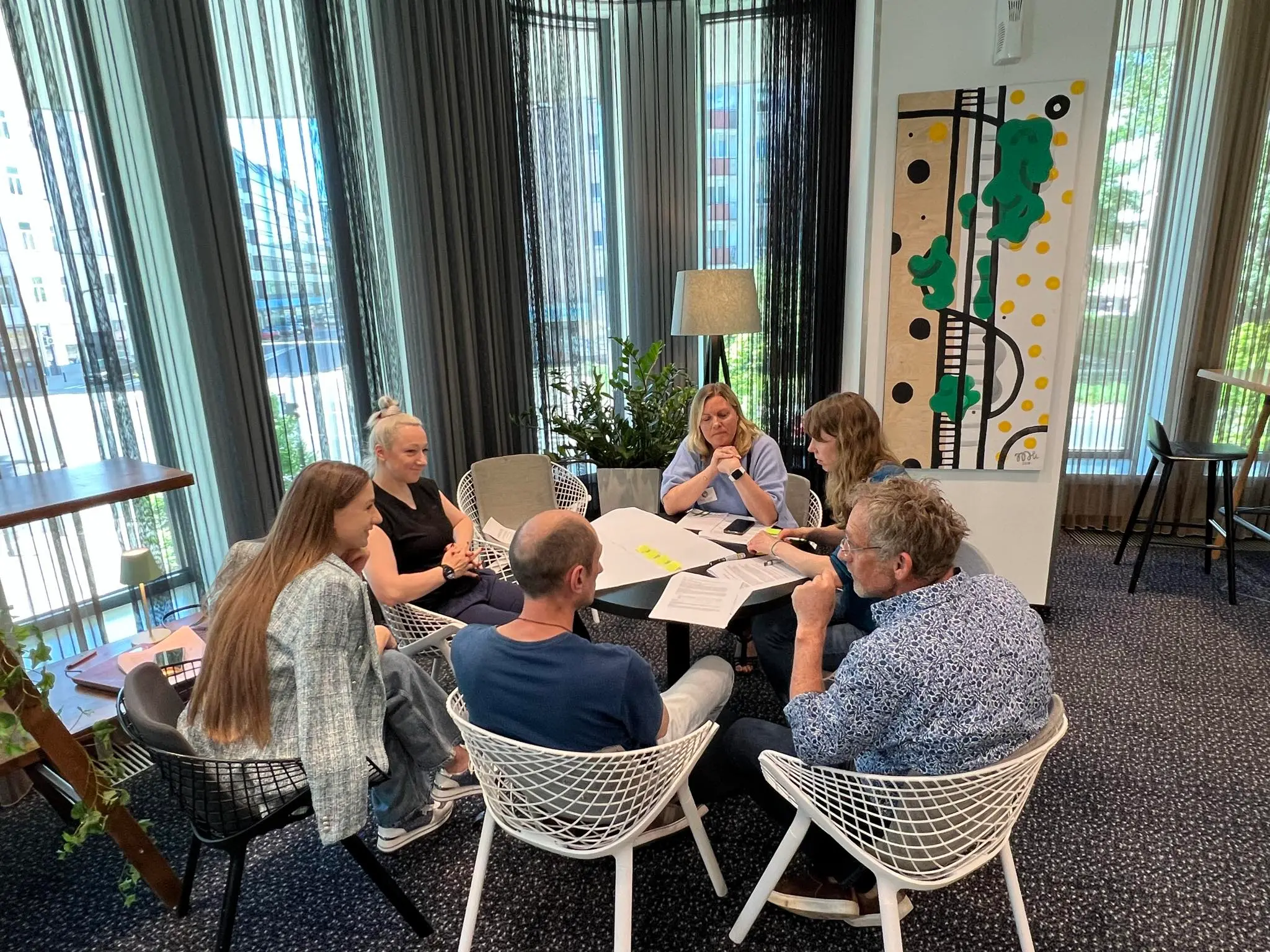 A group of people are discussing the skills needs of Ukraine.