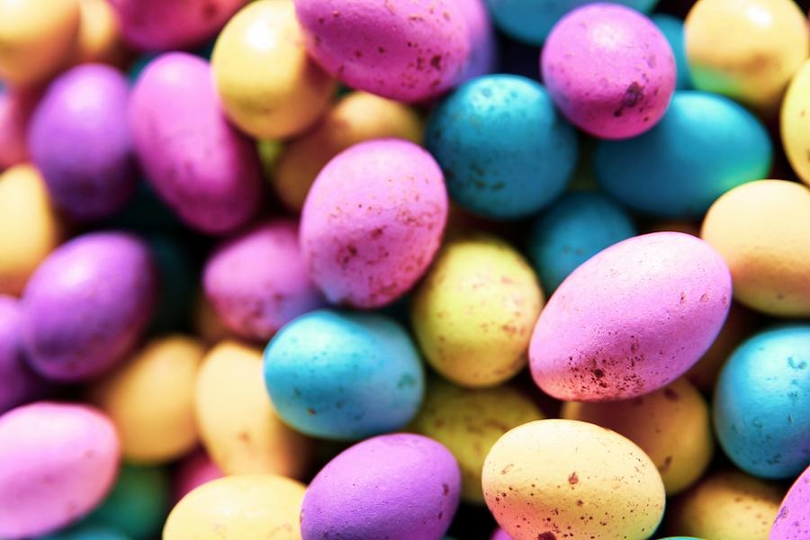 Pink, yellow and blue Easter candy eggs.